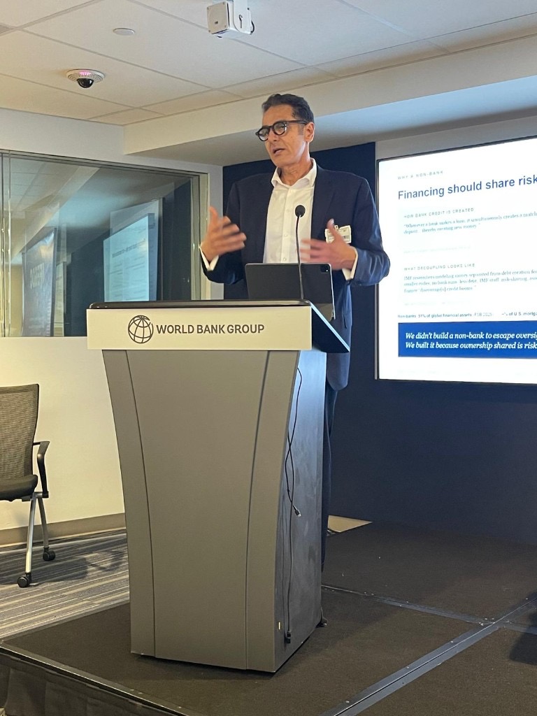 Kal Elsayed presenting at a World Bank Group podium during IFESDC 2026